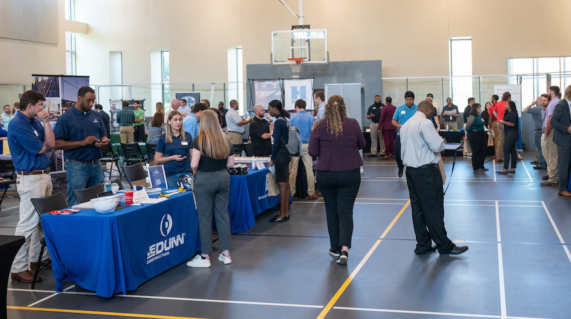 Students and employers at career fair